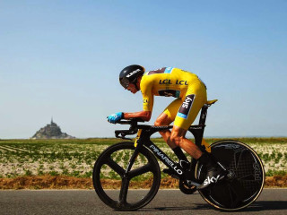 Man riding bike road field - eric de kolb free wallpaper