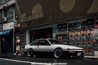White car parked street building 2 - clean free wallpaper