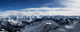 Mountain range plane window blue 2 - a view of a mountain range free wallpaper