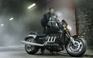 Man motorcycle warehouse smoke standing - the back of it free wallpaper