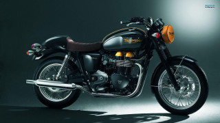 Black motorcycle dark room light - a black motorcycle free wallpaper