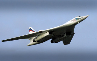 Jet flying blue sky tail - the side of the plane free wallpaper