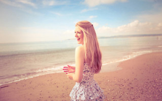 Woman beach ocean frisbee sky 2 - a frisbee free wallpaper