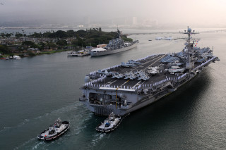 Large ship small boat larger - the water behind free wallpaper