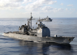 Large gray ship ocean background 2 - a large gray ship in the middle of the ocean free wallpaper