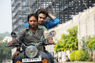 Men motorcycle city street building - movie still frame free wallpaper