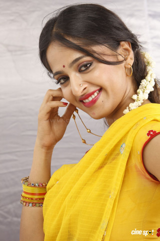 Woman yellow sari flower hair 2 - movie still frame free wallpaper