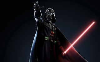 Star wars character light saber 2 - a star wars character holding free wallpaper