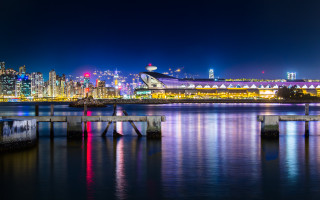 City skyline night bridge water 2 - a city skyline in the background free wallpaper