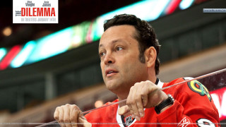 Man red jersey hockey stick - a stadium in the background free wallpaper