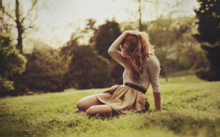 Woman sitting grass hair dress - her knee free wallpaper