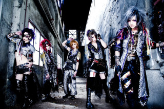 Women costume alleyway open door - vivid free wallpaper