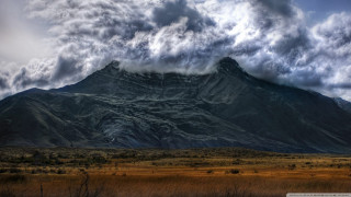 Mountain tall peak cloudy sky - a matte painting free wallpaper