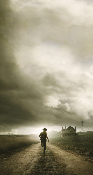 Man walking dirt road cloudy - under free wallpaper