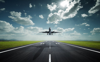 Jetliner flying cloudy sky runway 2 - andries stock free wallpaper