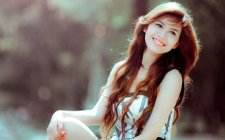 Woman smiling sitting ground pencil - phuoc quan free wallpaper