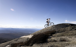 Man biking rocky hill valley - a man riding free wallpaper