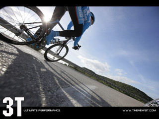 Person riding bike street hill - the sun shining free wallpaper