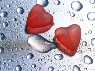 Two red hearts wet surface - wet free wallpaper