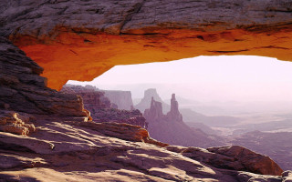 Large rock formation arch side - a large rock formation free wallpaper