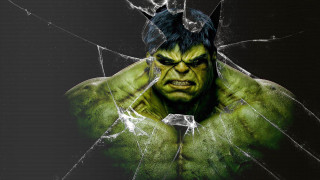 Green horned man shattered glass - a broken glass window free wallpaper