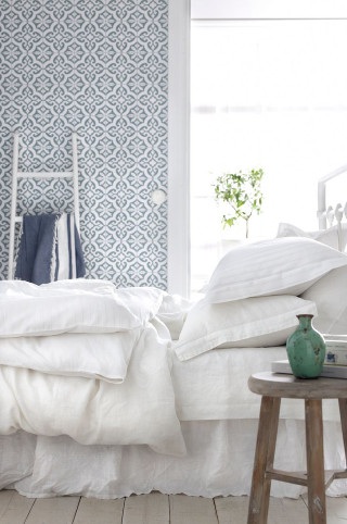Bed white sheets green vase - a table next free wallpaper