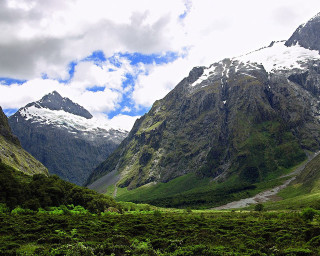 Mountain range river snow capped 3 - a river free wallpaper