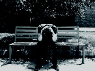 Man sitting bench head hands - his head in his hands free wallpaper