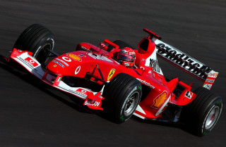 Red race car track people - a red race car free wallpaper