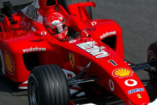 Man driving red race car - a red race car free wallpaper