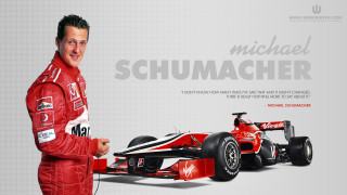 Man red suit standing next - a red suit free wallpaper