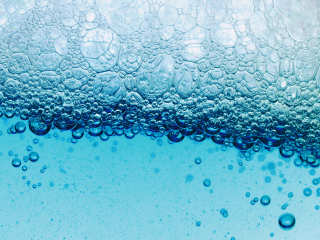 Water bubbles blue background white - a microscopic photo free wallpaper