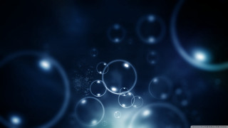 Blue bubbles floating blurry background - a blue light free wallpaper