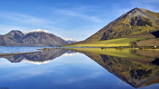 Mountain range reflection lake blue 2 - a mountain range in the background free wallpaper