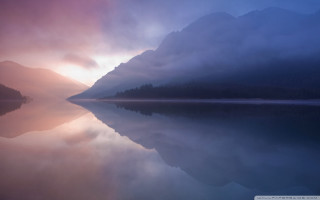 Lake mountain cloudy sky sunbeam - a sunbeam in the distance free wallpaper