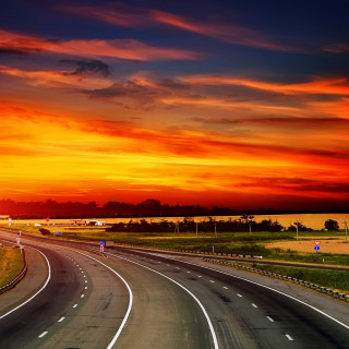 Highway sunset red sky clouds - a sunset in the background free wallpaper