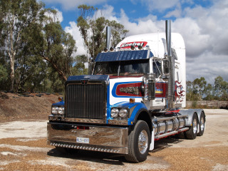 Semi truck dirt road trees - a semi truck free wallpaper