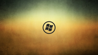 Logo wall brown yellow black - a picture of a logo free wallpaper
