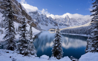 Lake snowy mountains forest sky - a mountain range free wallpaper