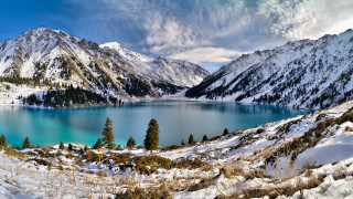 Lake snowy mountains cloudy sky - covered free wallpaper