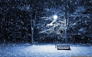 Bench snowy park night streetlight 5 - a bench in a snowy park free wallpaper