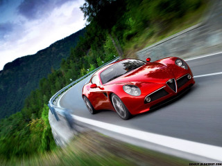 Red sports car mountain road 6 - cloudy free wallpaper