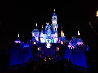 Castle lit night clock people - a castle free wallpaper
