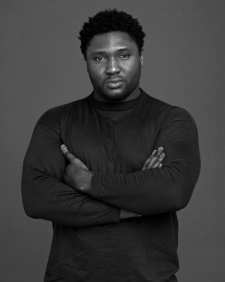 Man arms crossed posing black - studio portrait free wallpaper