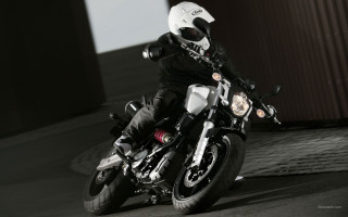 Man motorcycle street building helmet - a man riding free wallpaper