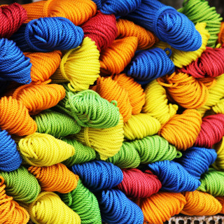 Multicolored yarn pile table basket - art free wallpaper