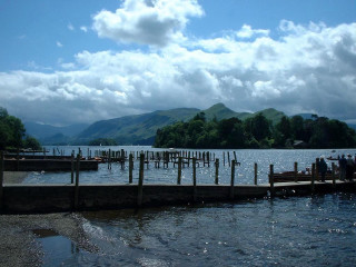Docked people mountains clouds lake - beatrix potter free wallpaper