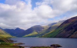 Lake mountains cloudy sky rocks 3 - mountain under a cloudy sky free wallpaper