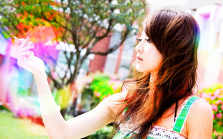 Woman holding colorful kite park - a park area free wallpaper