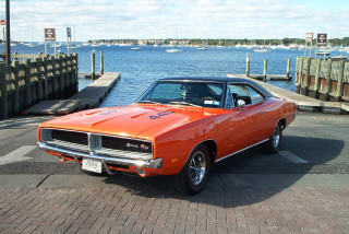Orange car water dock boats - an orange car free wallpaper